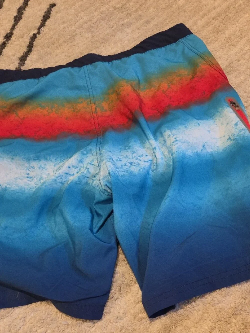 ZeroXposur Men's Blue Gradient Swim Board Shorts with Red Accent